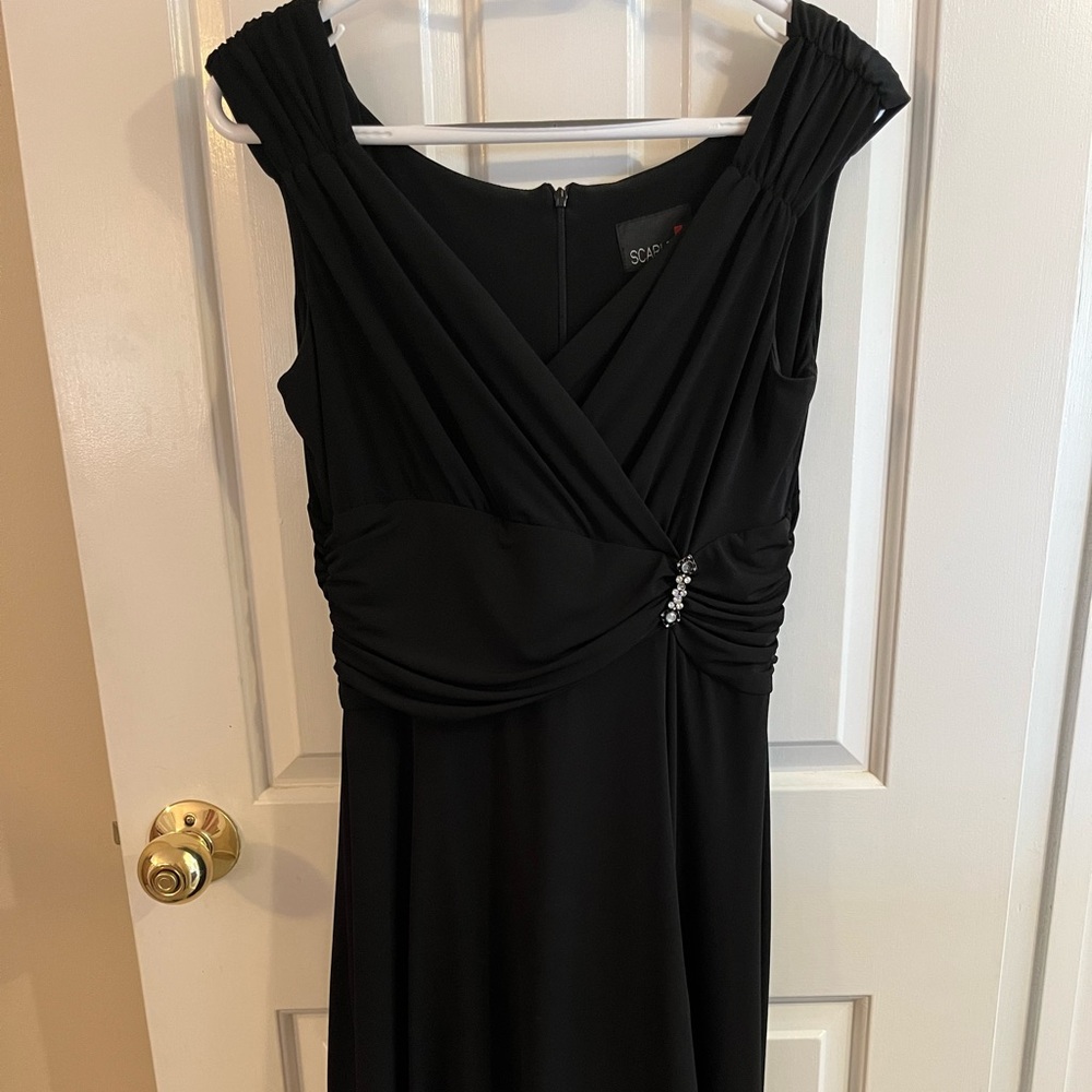 Black cocktail dress. Very figure flattering!
